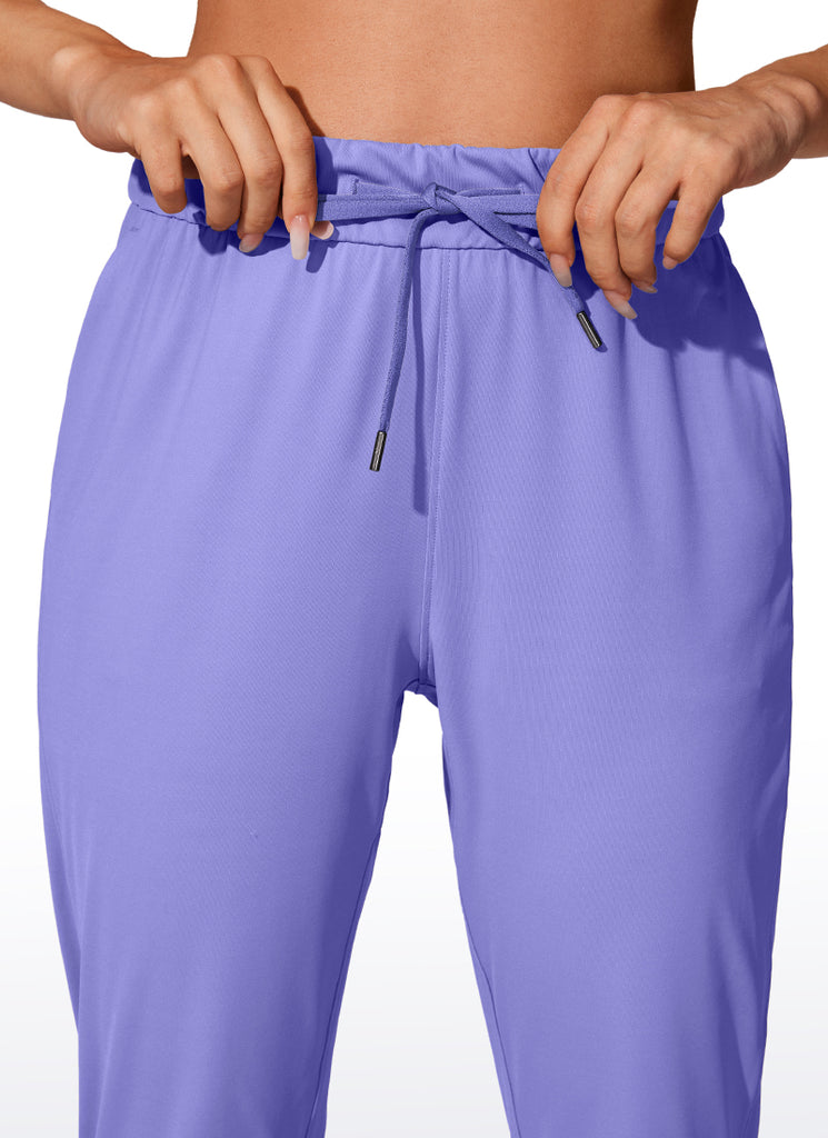 CRZ YOGA Women's Travel Slim Fit Stretch Drawstring Jogger 27'' Dark Lavender Purple