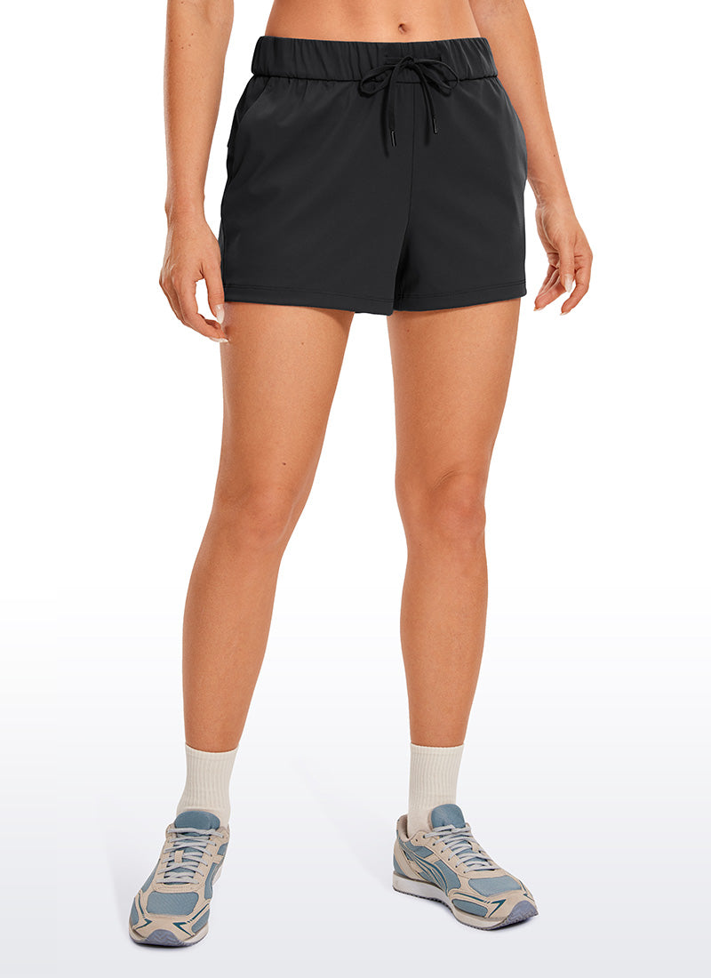CRZ YOGA Women's Travel Stretch Mid-Rise Drawstring Shorts 2.5