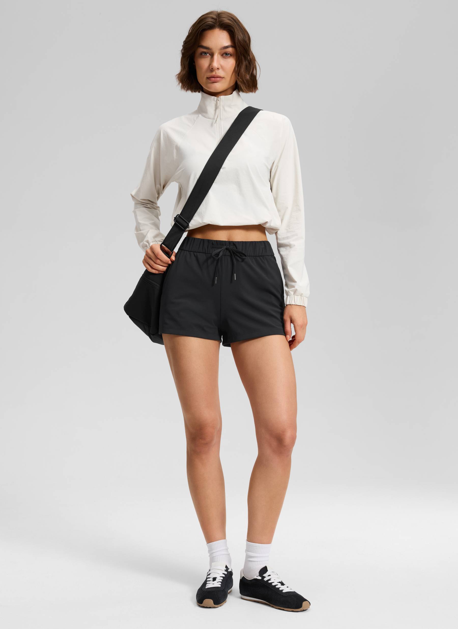 CRZ YOGA Women's Travel Stretch Mid-Rise Drawstring Shorts 2.5