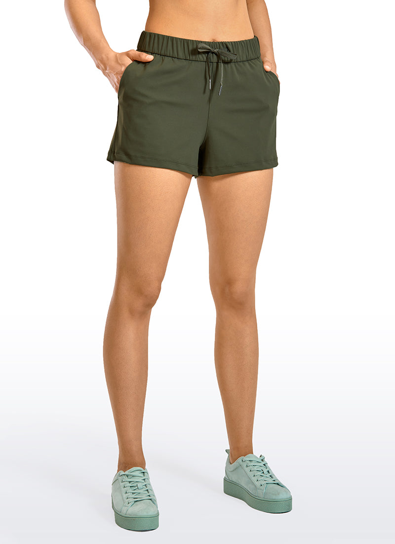 CRZ YOGA Women's Travel Stretch Mid-Rise Drawstring Shorts 2.5