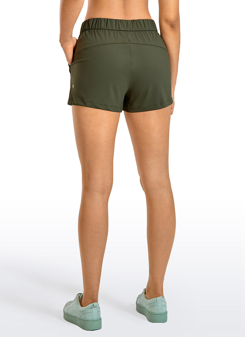 CRZ YOGA Women's Travel Stretch Mid-Rise Drawstring Shorts 2.5