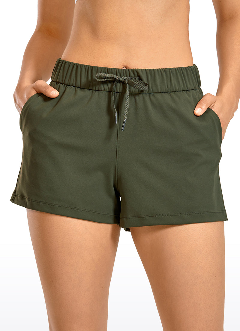 CRZ YOGA Women's Travel Stretch Mid-Rise Drawstring Shorts 2.5