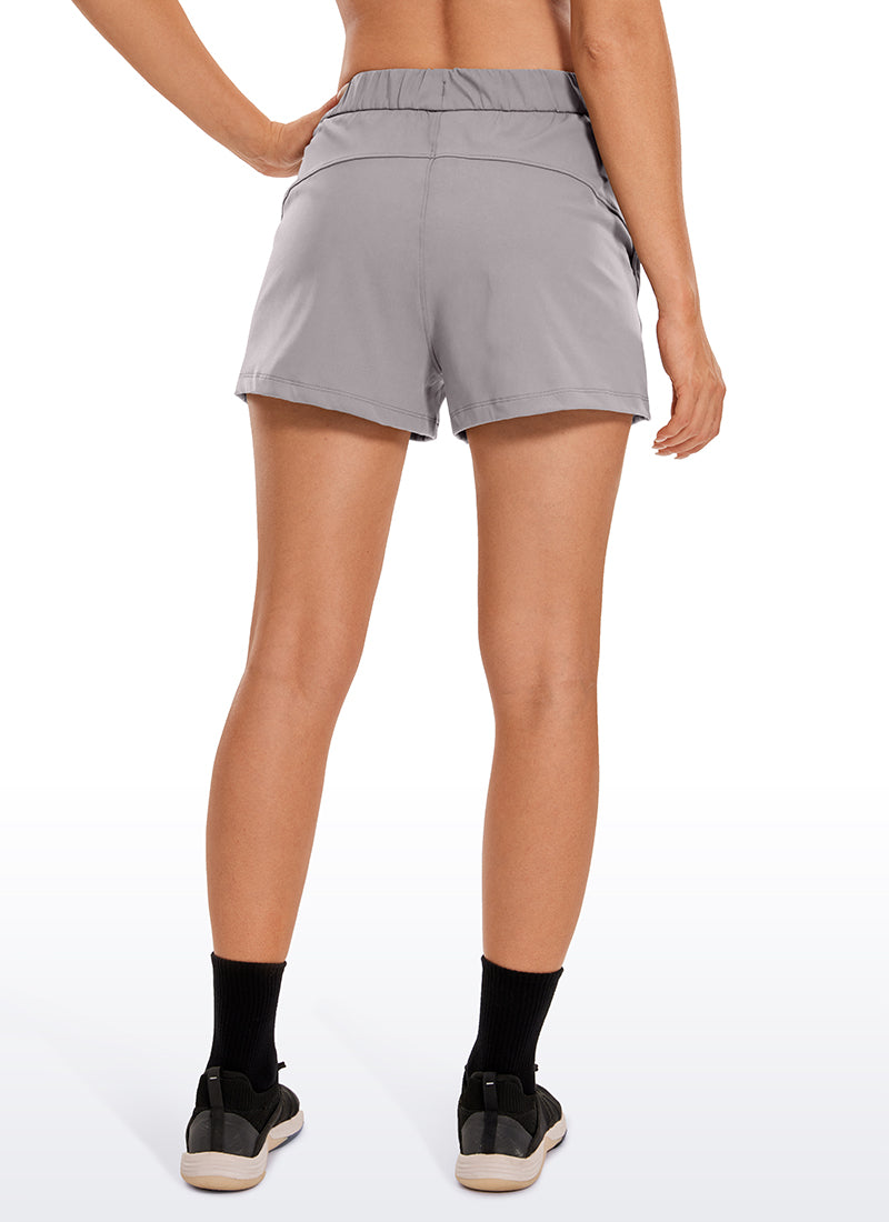 CRZ YOGA Women's Travel Stretch Mid-Rise Drawstring Shorts 2.5
