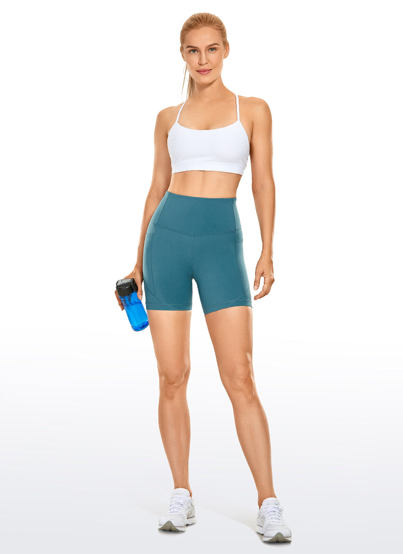CRZ YOGA Women's Train High Rise Biker Nakedfeel Pocket Shorts 5'' stone-washed indigo