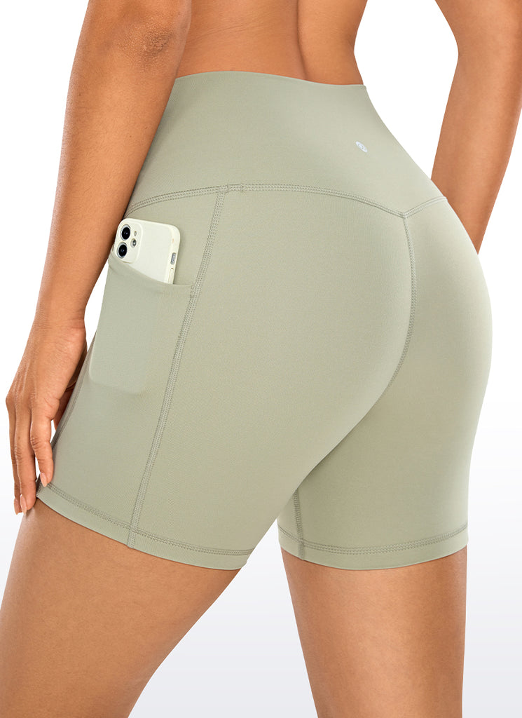 CRZ YOGA Women's Train High Rise Biker Nakedfeel Pocket Shorts 5'' Olive yellow
