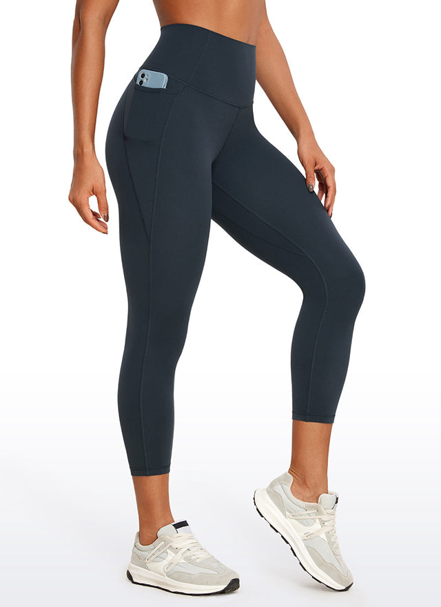 CRZ YOGA Womens Butterluxe High Waist Pockets Capri Leggings 23'' True Navy @model_info:Gigi