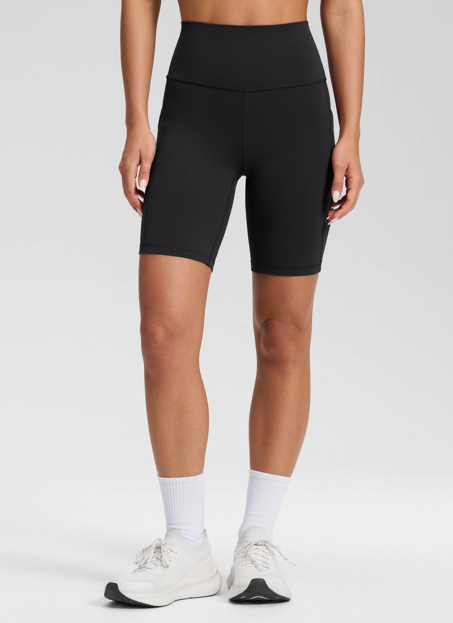 CRZ YOGA Women's Yoga High Rise Biker Butterluxe Pockets Shorts 8'' Black @model_info:Isidora