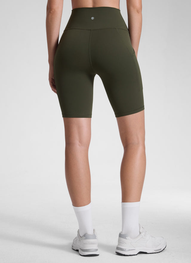 CRZ YOGA Women's Yoga High Rise Biker Butterluxe Pockets Shorts 8'' Olive Green @model_info:Malisa