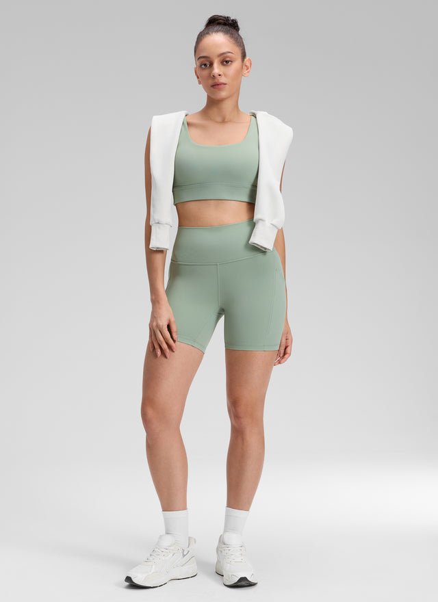 CRZ YOGA Women's Yoga High Rise Biker Butterluxe Pockets Shorts 5'' Green Palm Court @model_info:Bruna