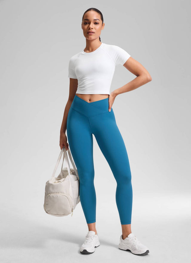 CRZ YOGA Women's High Rise Butterluxe Yoga Leggings 25'' V Cross Waist Super-sonic Blue @model_info:Fiona