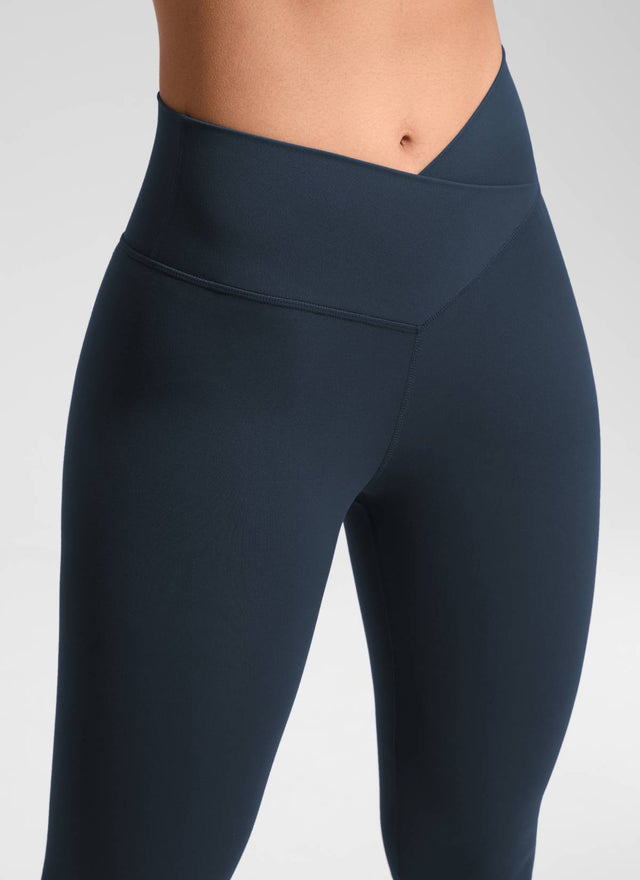 CRZ YOGA Women's High Rise Butterluxe Yoga Leggings 25'' V Cross Waist True Navy @model_info:Fiona