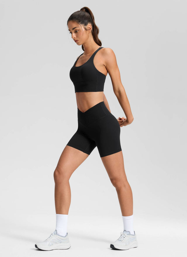 CRZ YOGA Women's High Rise Butterluxe V Cross Waist Biker Shorts 5'' Black @model_info:Isidora