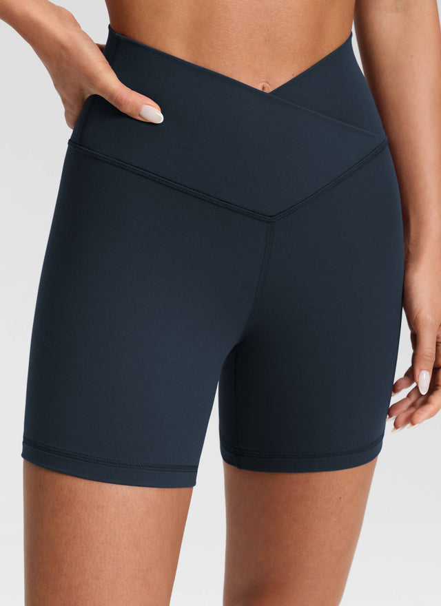 CRZ YOGA Women's High Rise Butterluxe V Cross Waist Biker Shorts 5'' True Navy @model_info:Isidora
