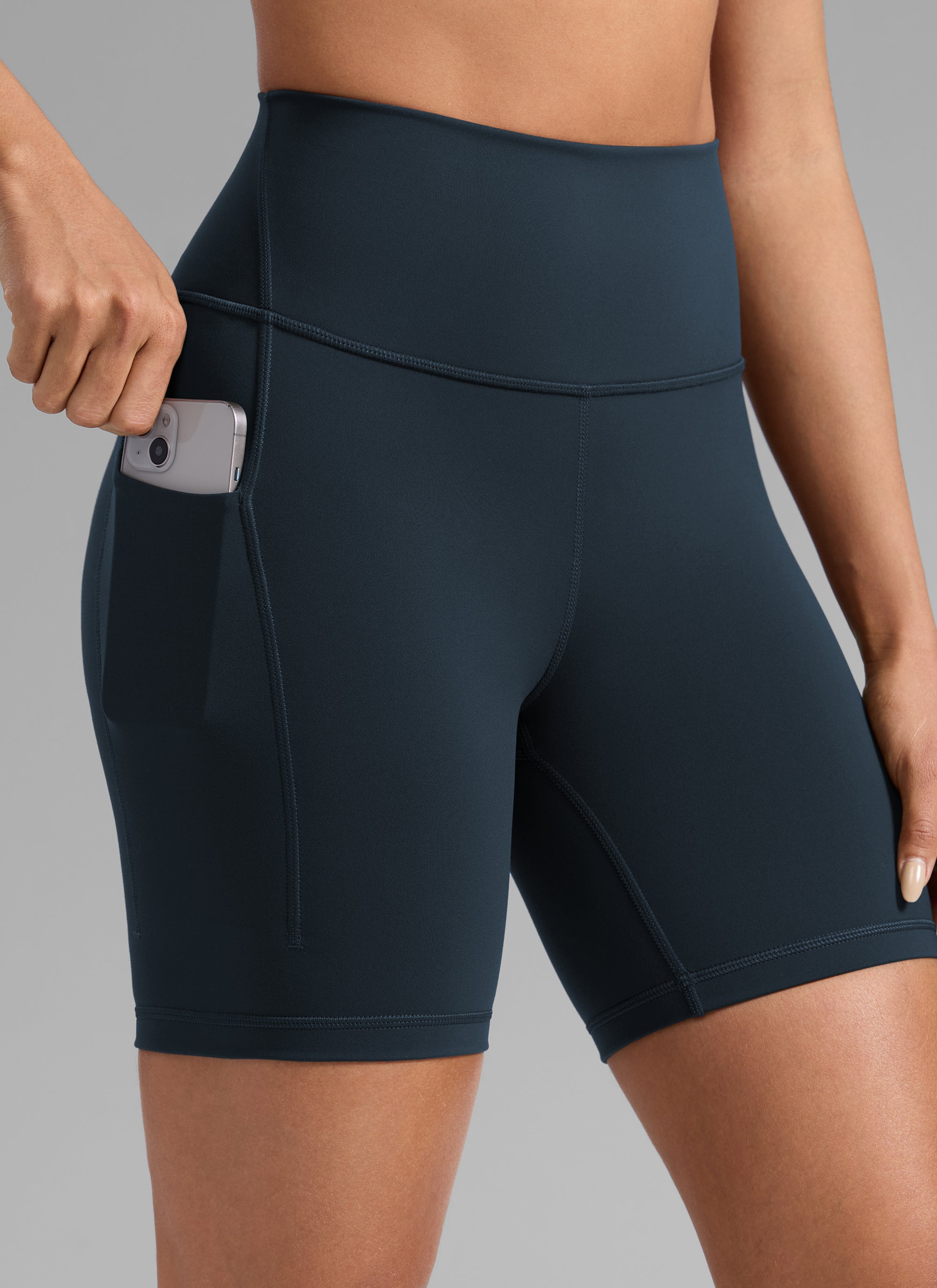 CRZ YOGA Women's Workout High Rise Pocket Shorts Butterbreeze Shorts 6'' True Navy @model_info:Dany