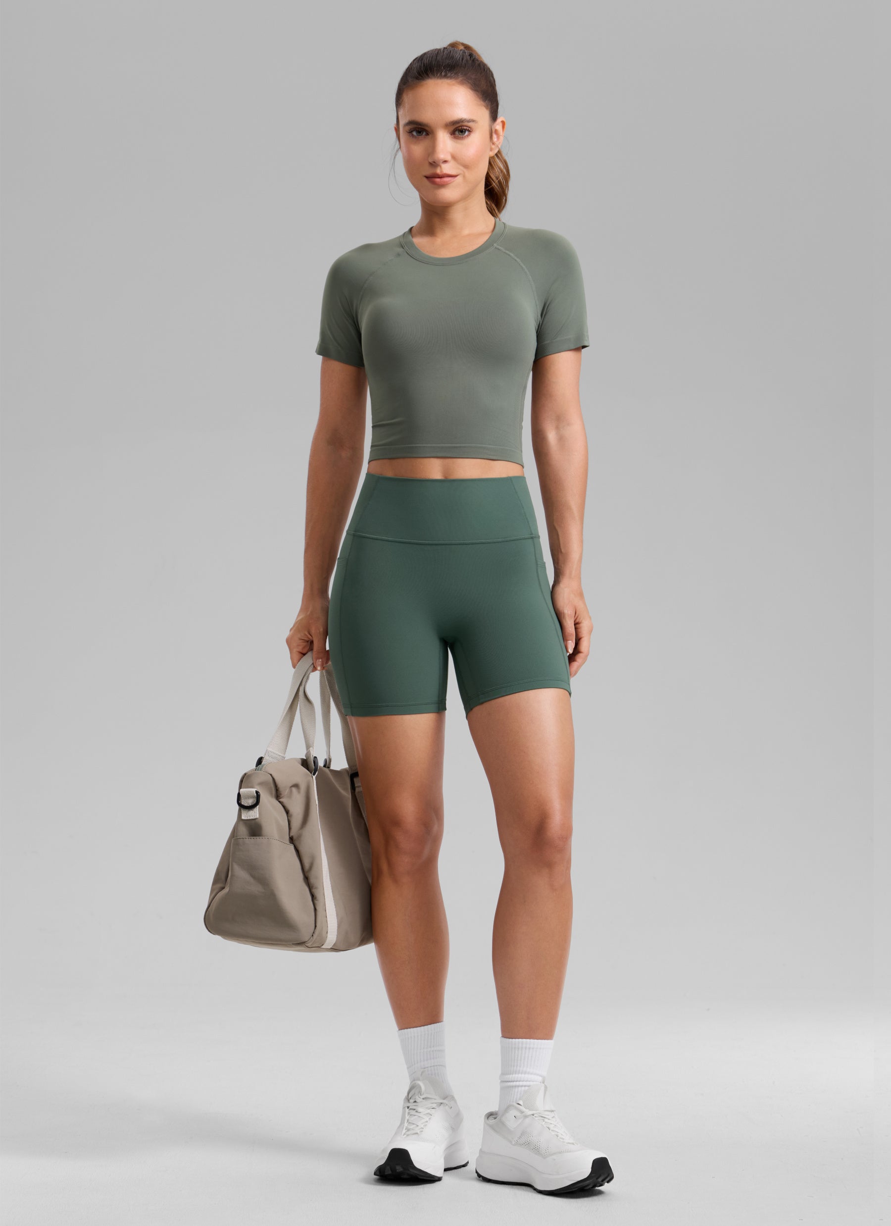 CRZ YOGA Butterlift Womens Scrunch Butt No Front Seam Pocket Biker Shorts 5'' Dark Forest Green @model_info:A