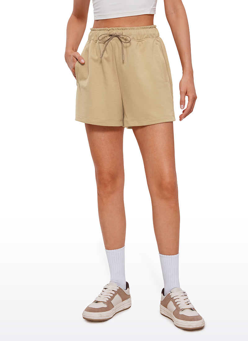 CRZ YOGA Women's Cotton High Waisted Sweat Shorts 4'' California Sand @model_info:VLA