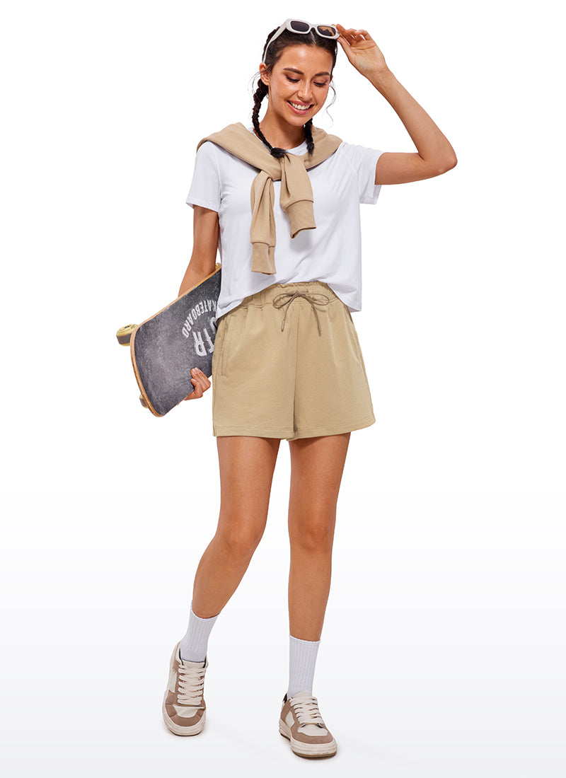 CRZ YOGA Women's Cotton High Waisted Sweat Shorts 4'' California Sand @model_info:VLA
