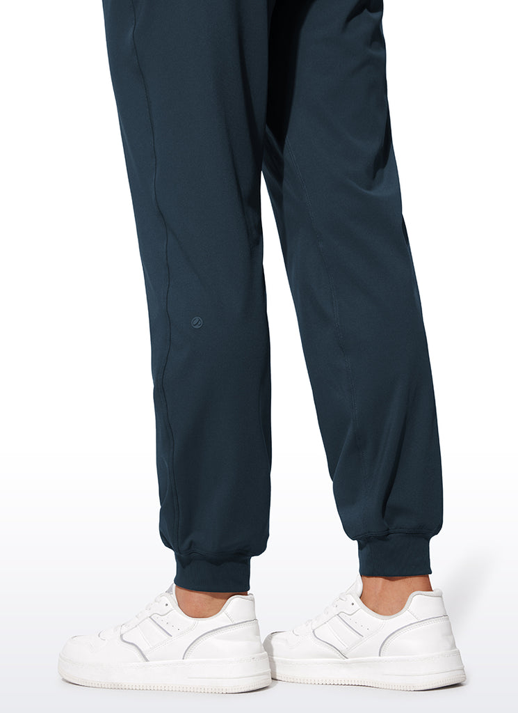 CRZ YOGA Women 4-Way Stretch High Waisted Pockets Joggers Casual 28" True Navy
