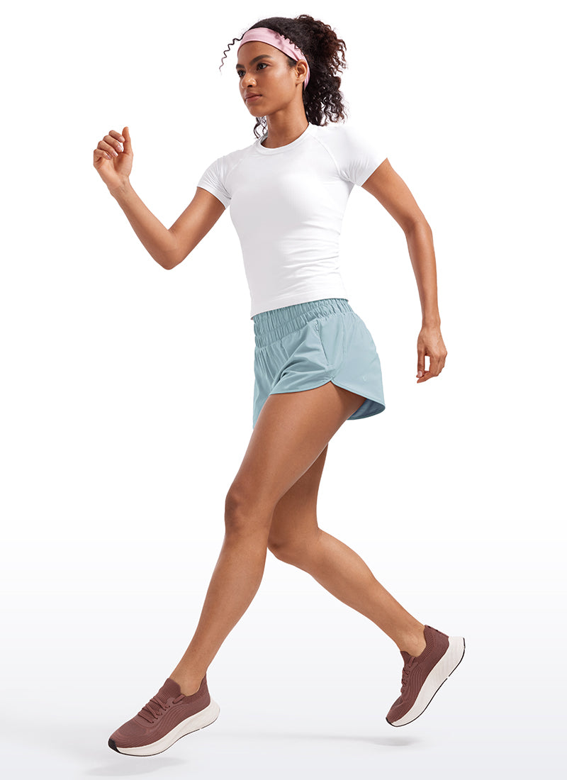 CRZ YOGA Women's Running Feathery-Fit Soft High Rise Shorts Pocket 3'' Light grayish blue @model_info:Amanda