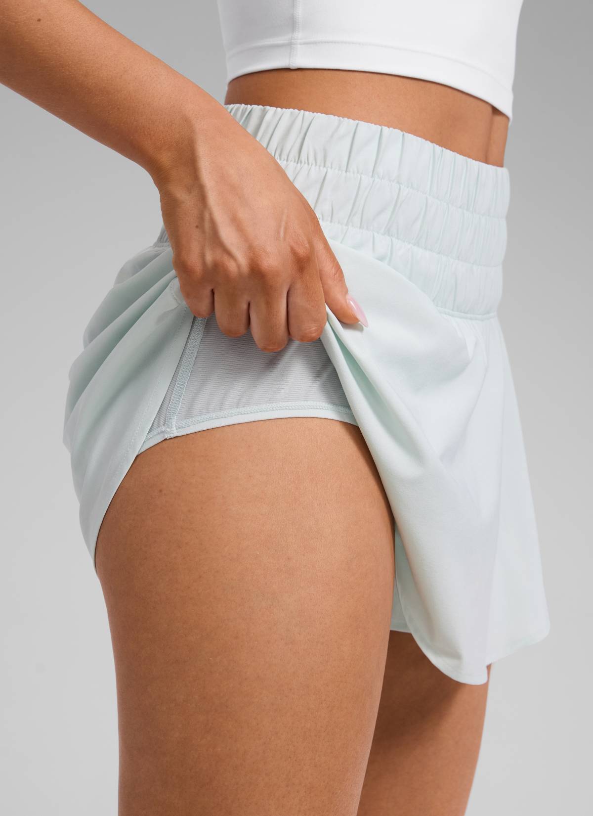 CRZ YOGA Women's Running Tennis High Waisted 2 in 1 Flowy Shorts Ocean Air @model_info:Lary