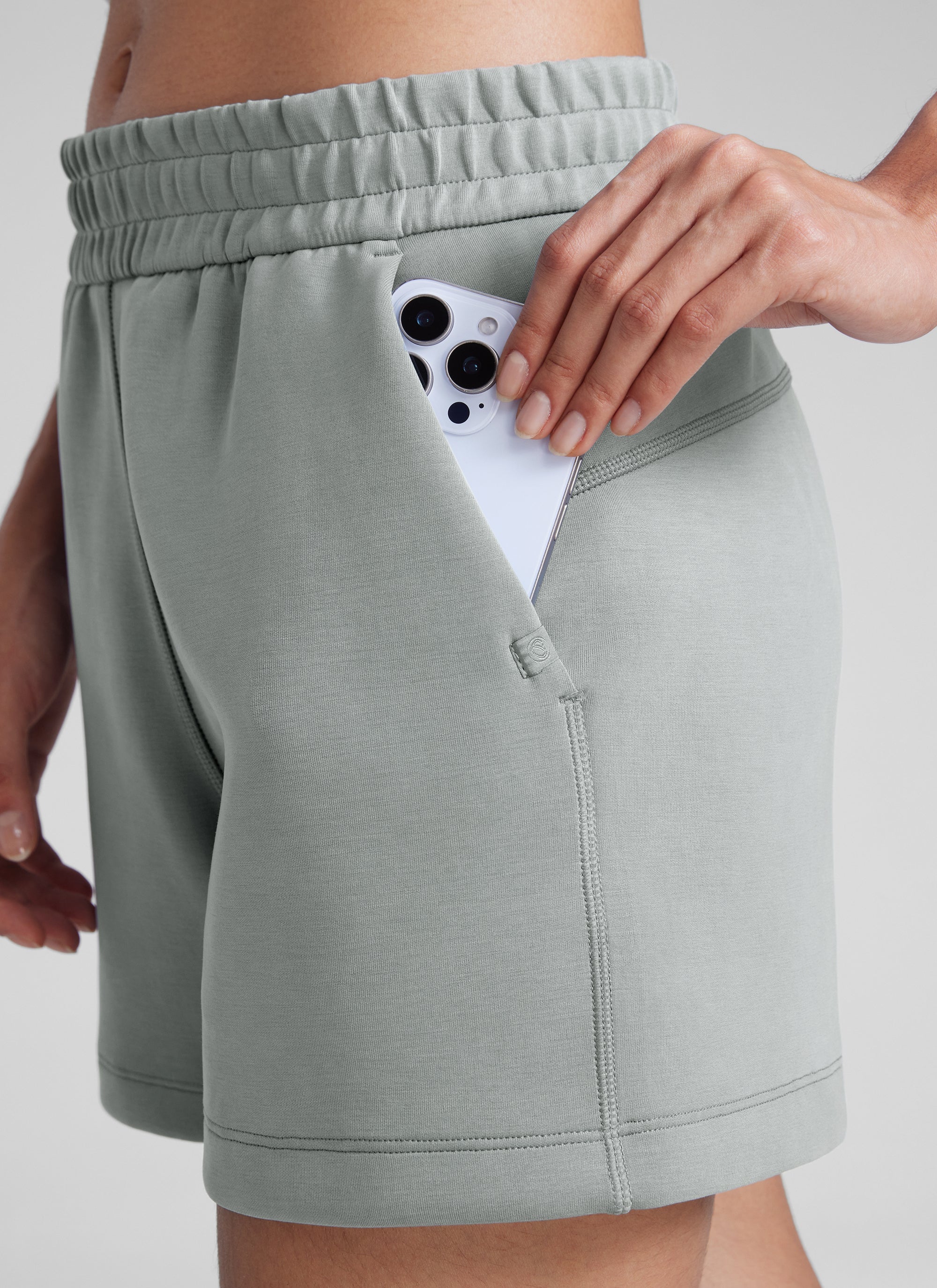 CRZYOGA Women SoftAura Sweat Shorts 4” with Pockets Drawstring Sterling @model_info:Paula