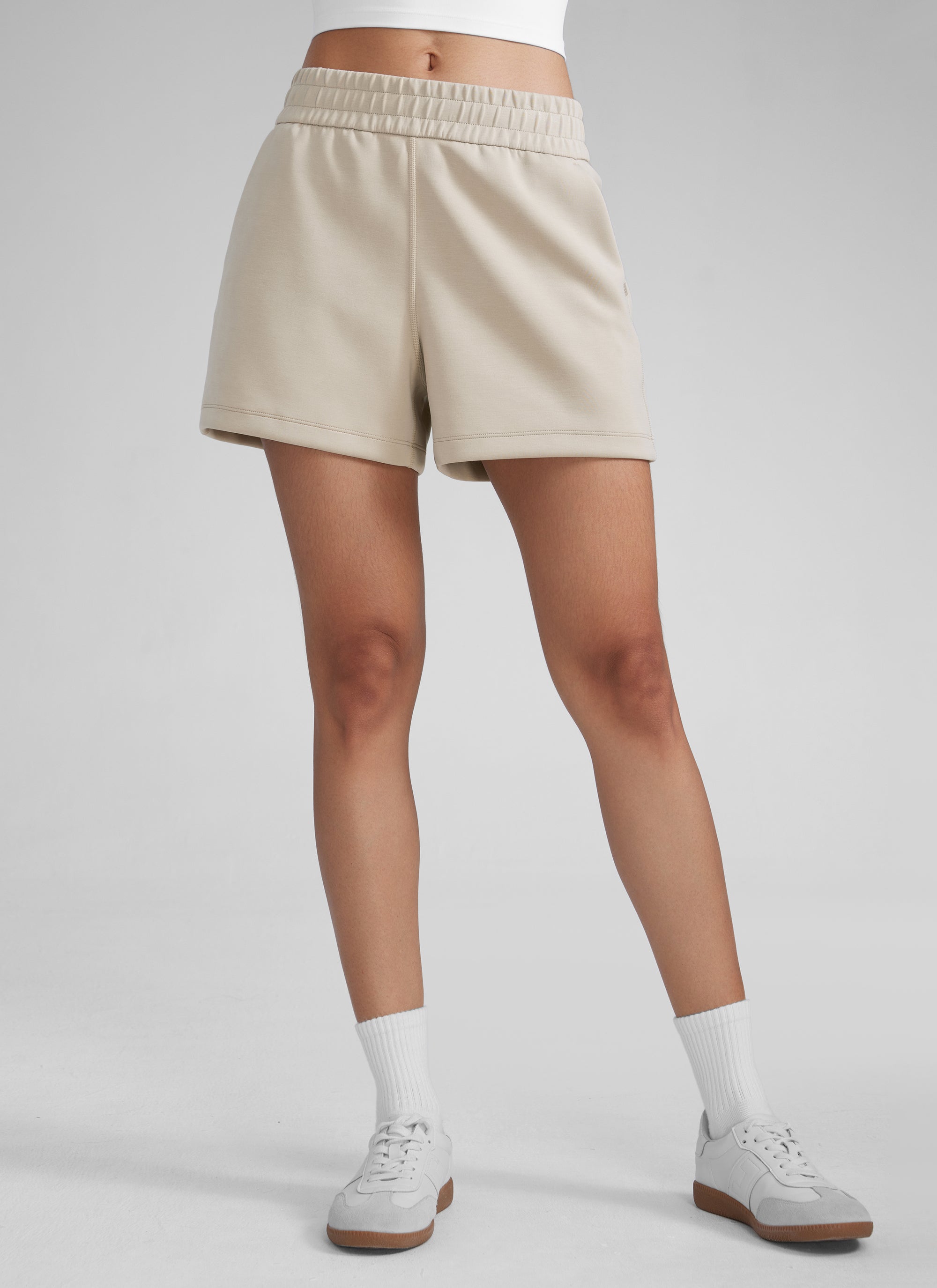 CRZYOGA Women SoftAura Sweat Shorts 4” with Pockets Drawstring Mojave Tan @model_info:Paula
