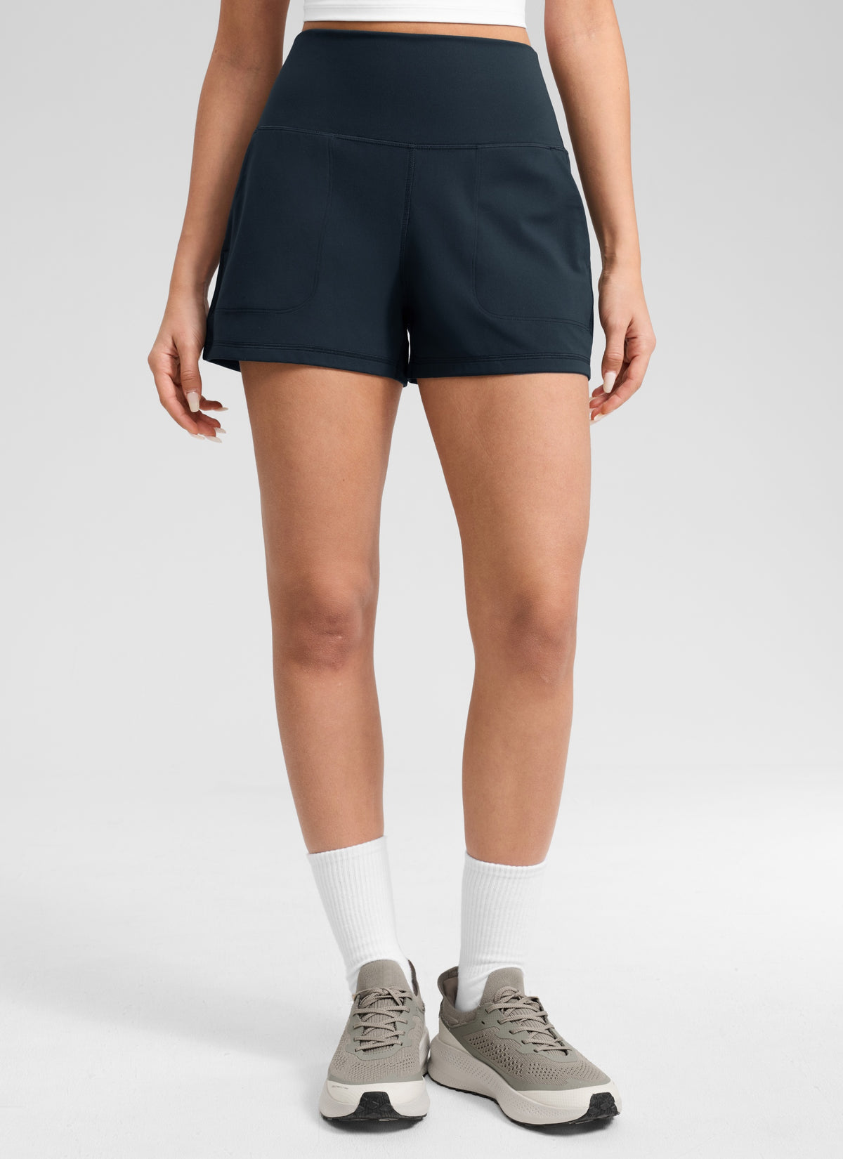 CRZ YOGA Women Butterlift High Waisted Shorts with Pockets Linerless True Navy @model_info:Anano