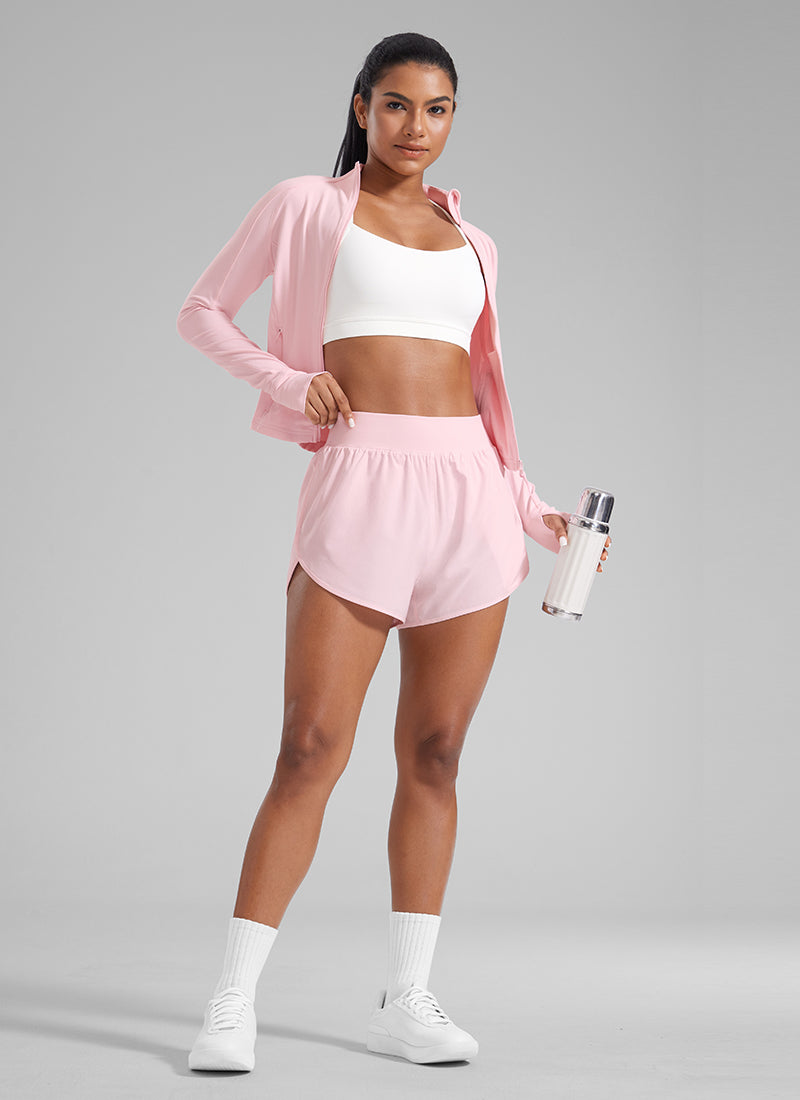 CRZ YOGA Women's High Waisted Dolphin Shorts 3” With Zipper Pockets Liner Strawberry Pink @model_info:Amanda