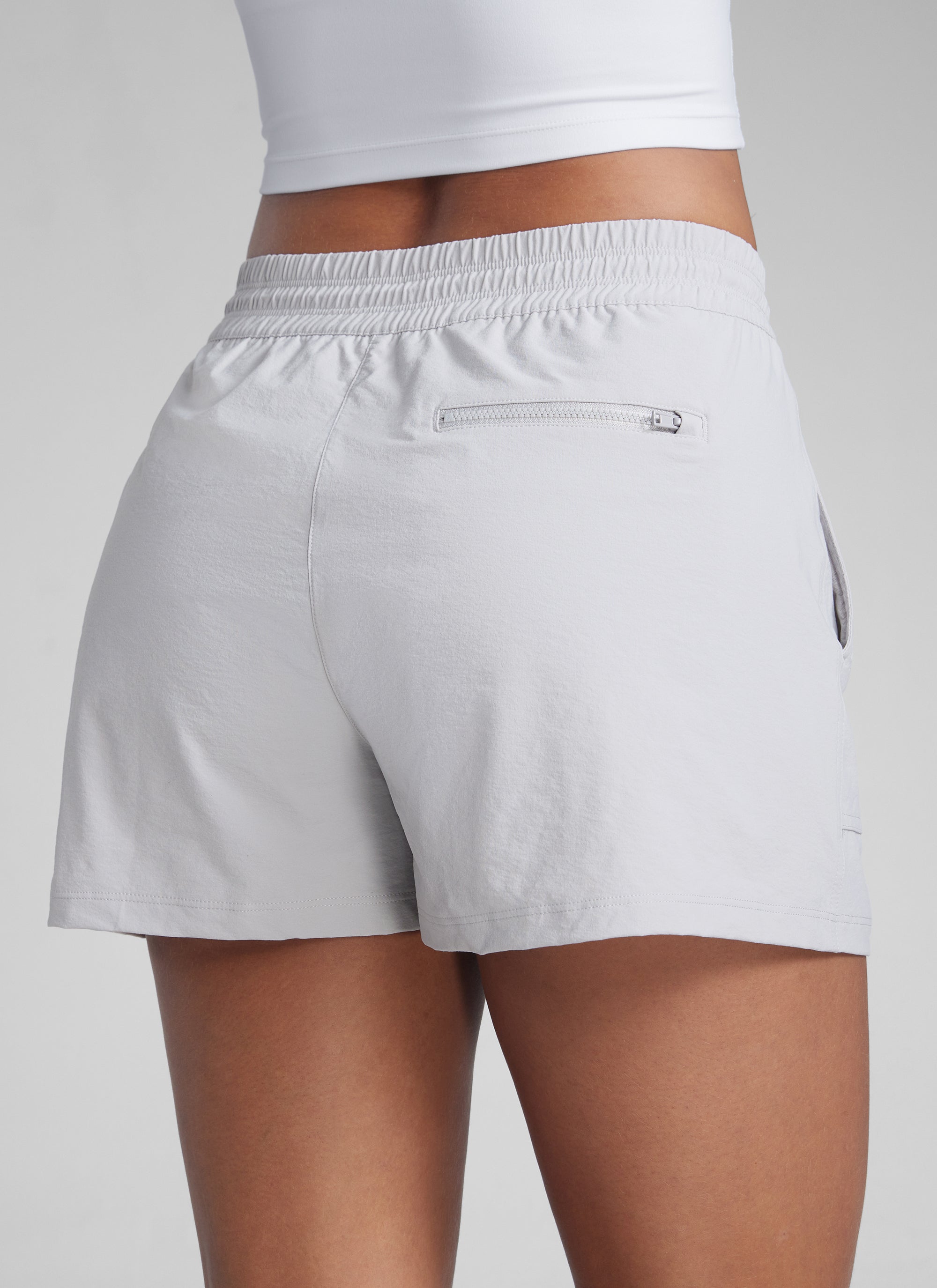 CRZYOGA Women's Lightweight Stretch Water-Repellent Hiking Pocket Short 3'' Platinum Grey @model_info:Gigi