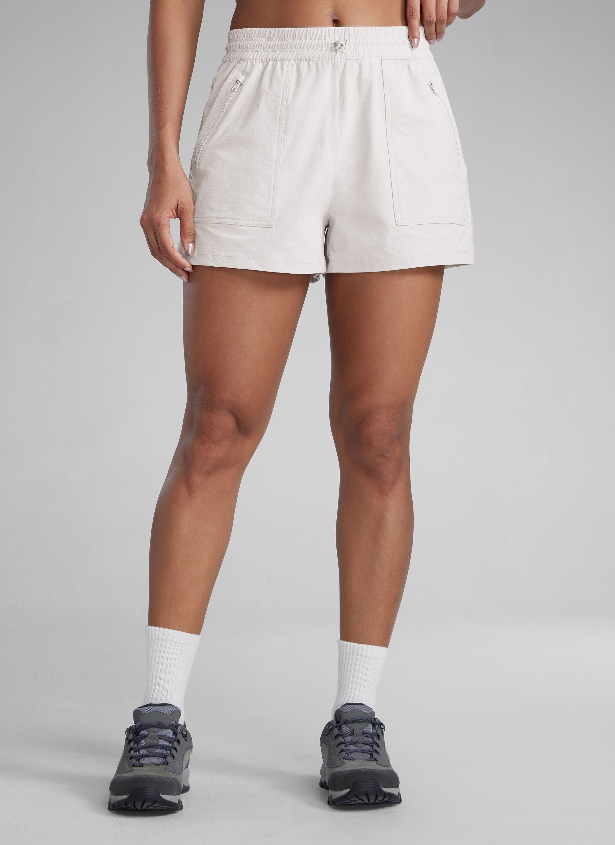 CRZYOGA Women's Lightweight Stretch Water-Repellent Hiking Pocket Short 3'' Milky White @model_info:Gigi