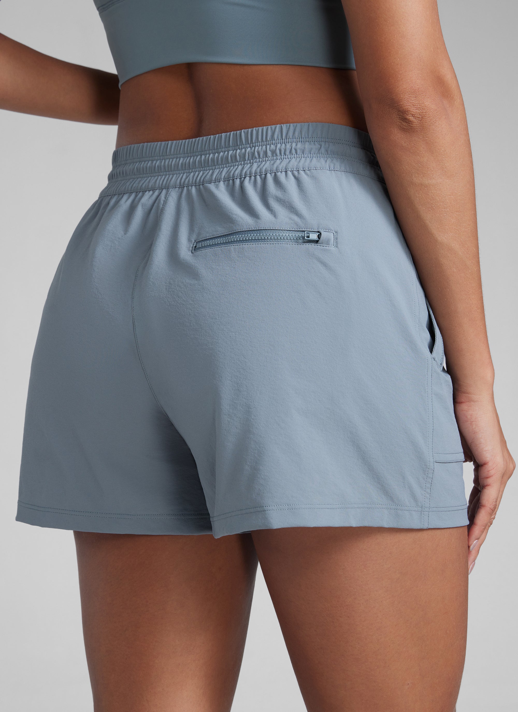 CRZYOGA Women's Lightweight Stretch Water-Repellent Hiking Pocket Short 3'' Belgian Blue @model_info:Gigi