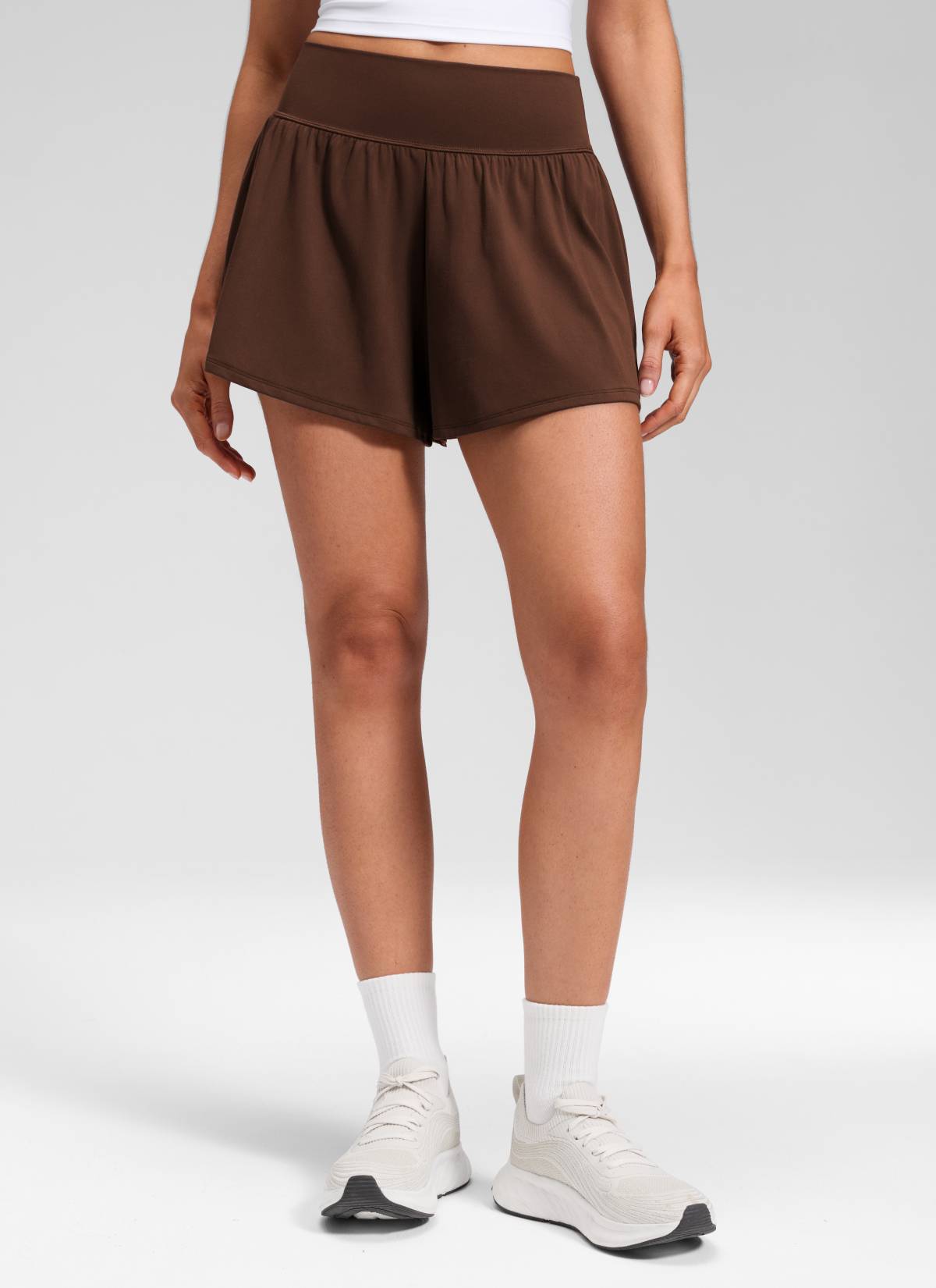 CRZ YOGA Women's Softretch Yoga High Rise Pocket Flowy 2 in 1 Shorts Lava Brown @model_info:Marcela