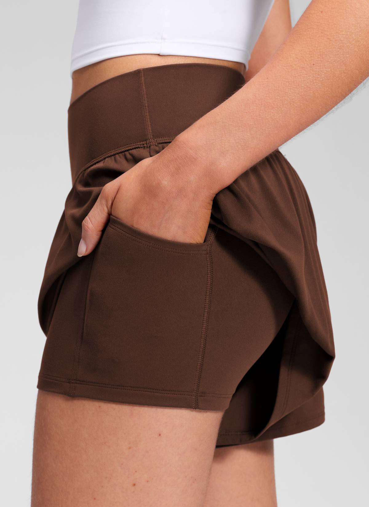 CRZ YOGA Women's Softretch Yoga High Rise Pocket Flowy 2 in 1 Shorts Lava Brown @model_info:Marcela
