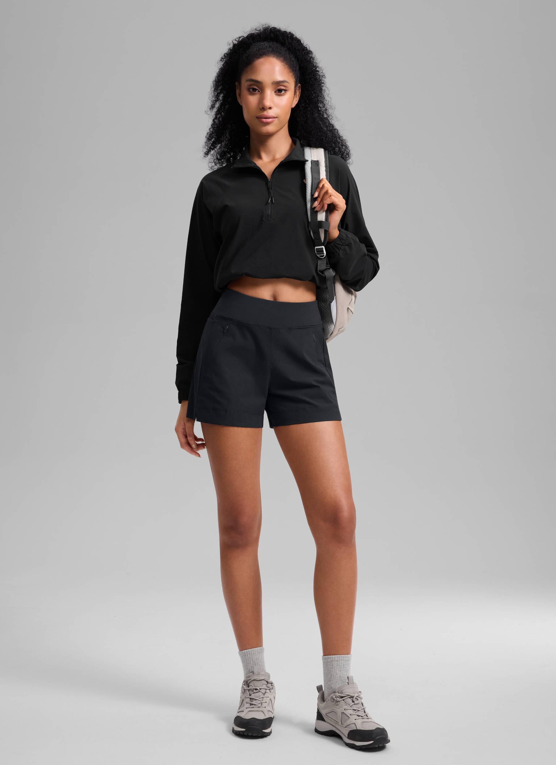 CRZ YOGA Women's Hiking Ripstop Mid-Rise Hiking Shorts Zip Pockets 4'' Black @model_info:Samira