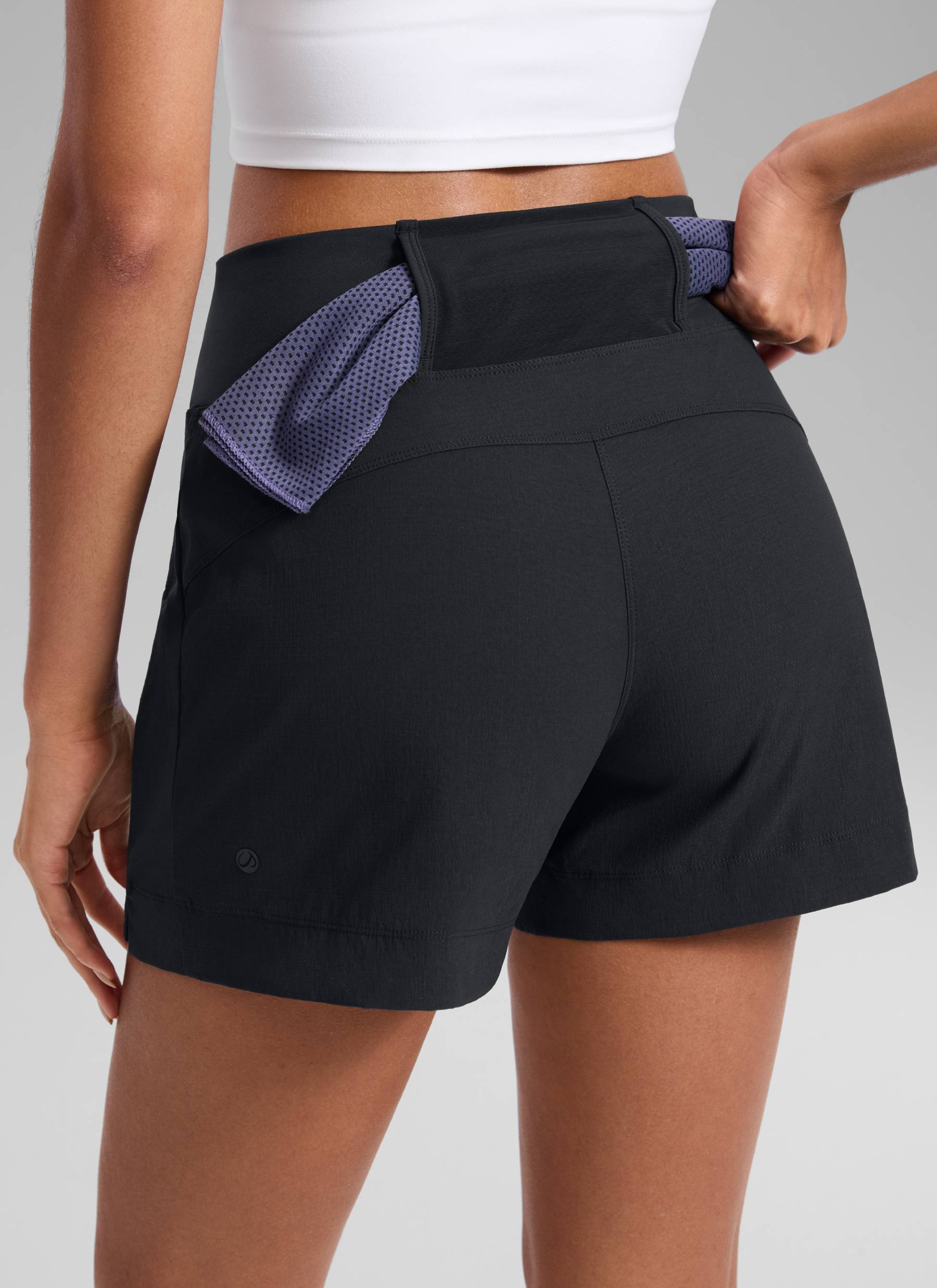 CRZ YOGA Women's Hiking Ripstop Mid-Rise Hiking Shorts Zip Pockets 4'' Black @model_info:Samira