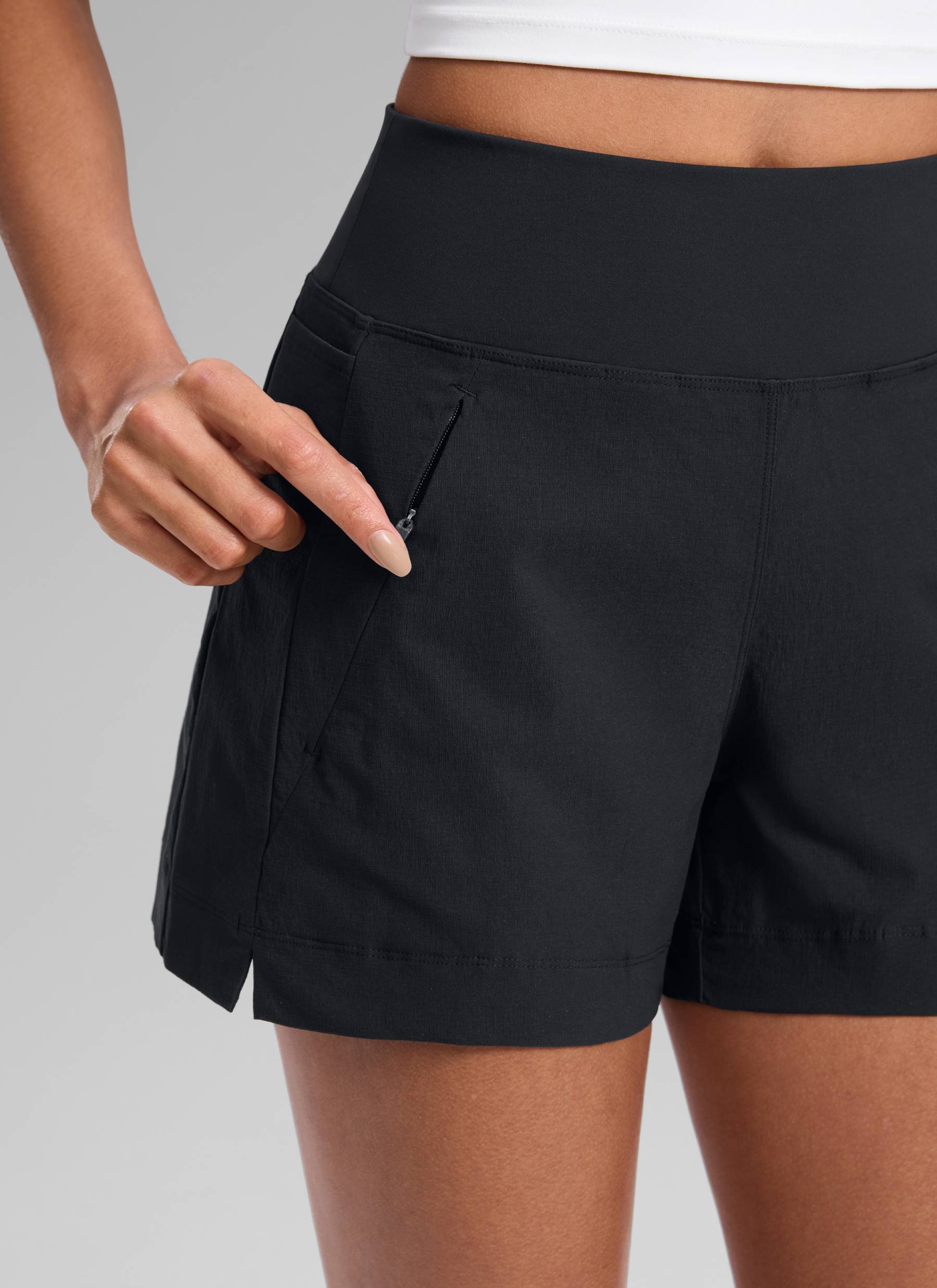 CRZ YOGA Women's Hiking Ripstop Mid-Rise Hiking Shorts Zip Pockets 4'' Black @model_info:Samira