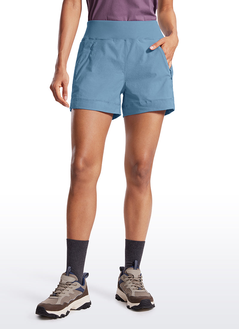 CRZ YOGA Women's Hiking Ripstop Mid-Rise Hiking Shorts Zip Pockets 4'' Universe Blue @model_info:Amanda