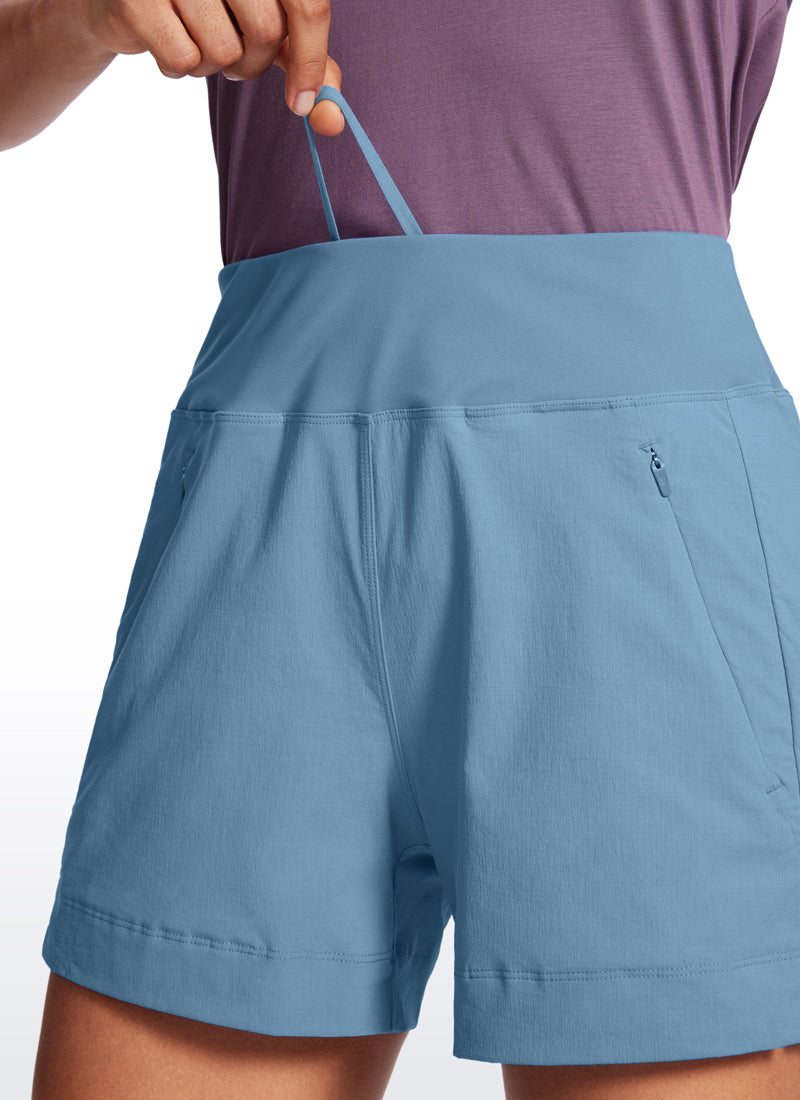 CRZ YOGA Women's Hiking Ripstop Mid-Rise Hiking Shorts Zip Pockets 4'' Universe Blue @model_info:Amanda