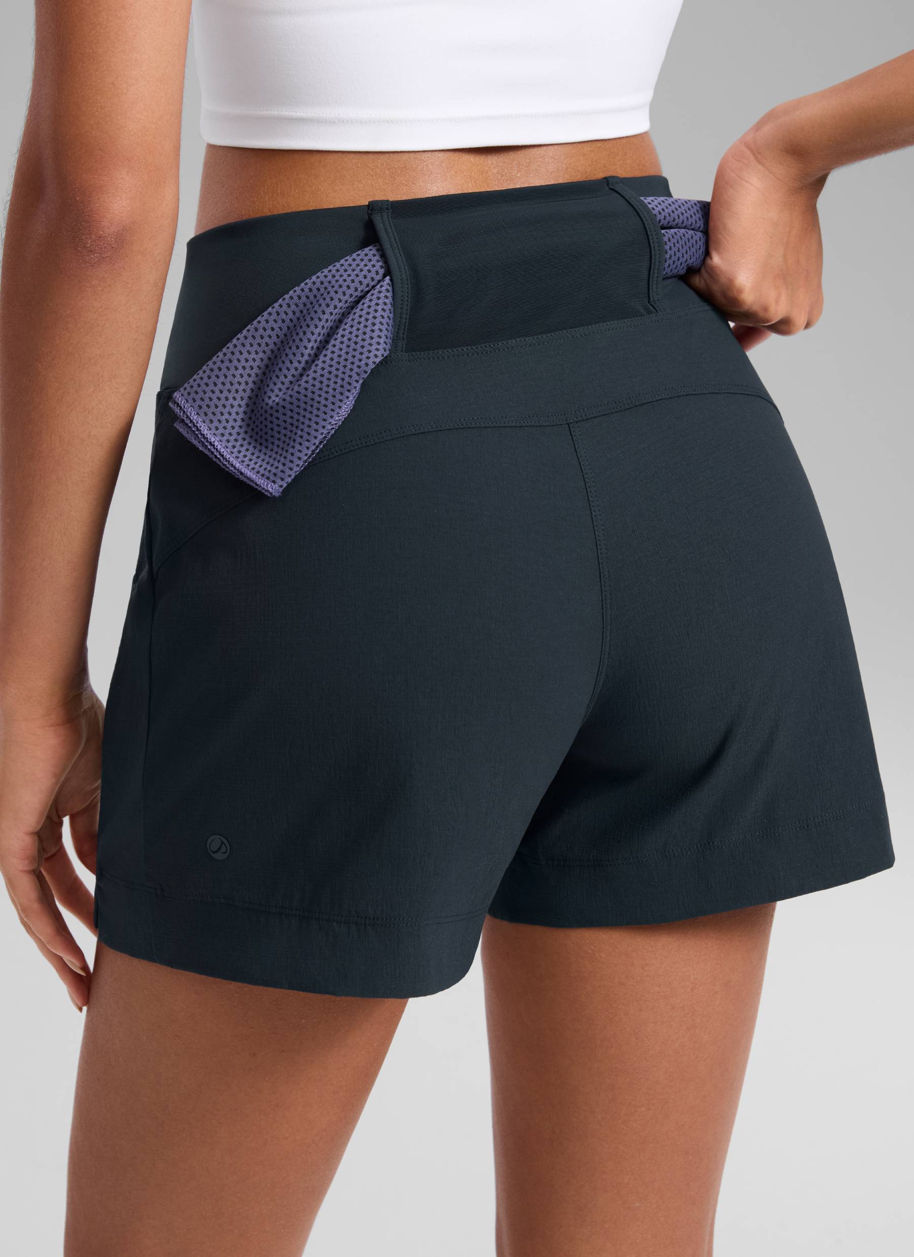 CRZ YOGA Women's Hiking Ripstop Mid-Rise Hiking Shorts Zip Pockets 4'' True Navy @model_info:Samira