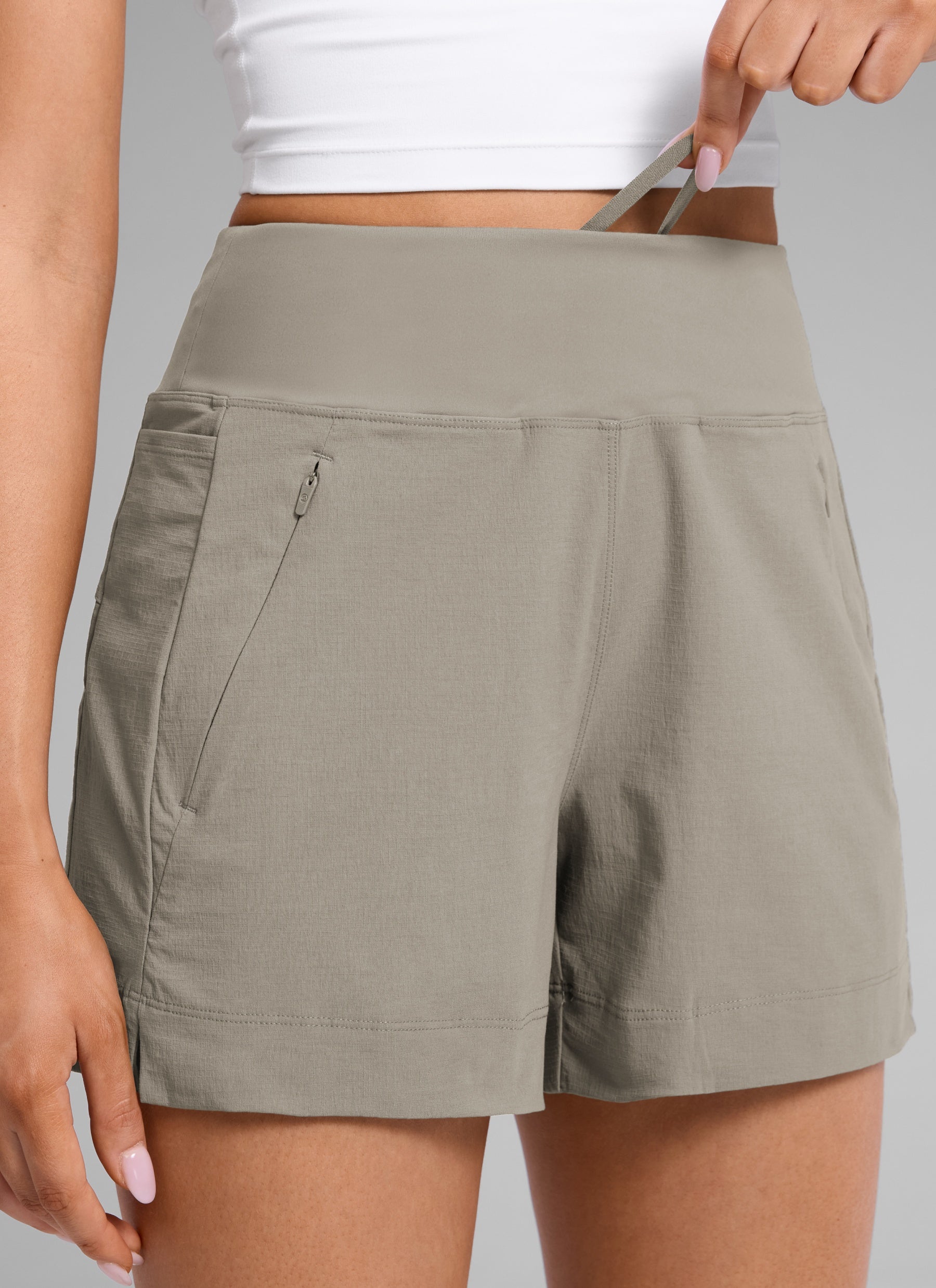 CRZ YOGA Women's Hiking Ripstop Mid-Rise Hiking Shorts Zip Pockets 4'' Cliff Ash @model_info:Lary