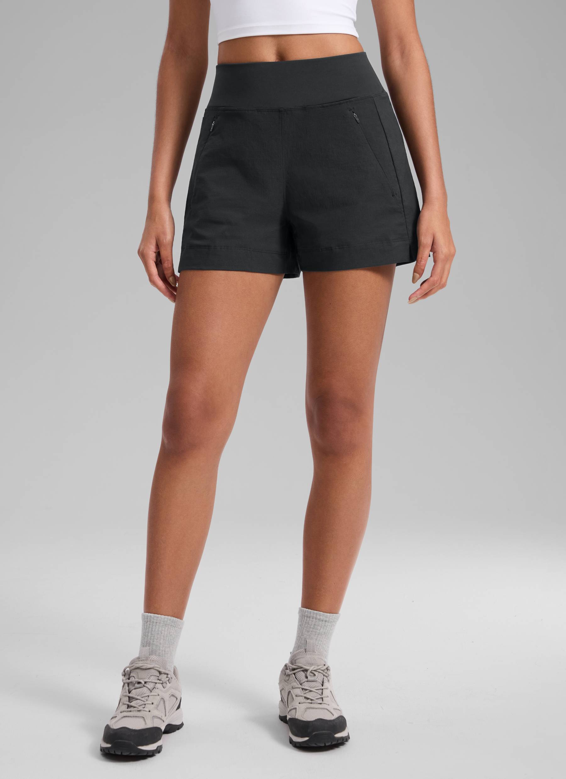 CRZ YOGA Women's Hiking Ripstop Mid-Rise Hiking Shorts Zip Pockets 4'' Ink Gray @model_info:Samira