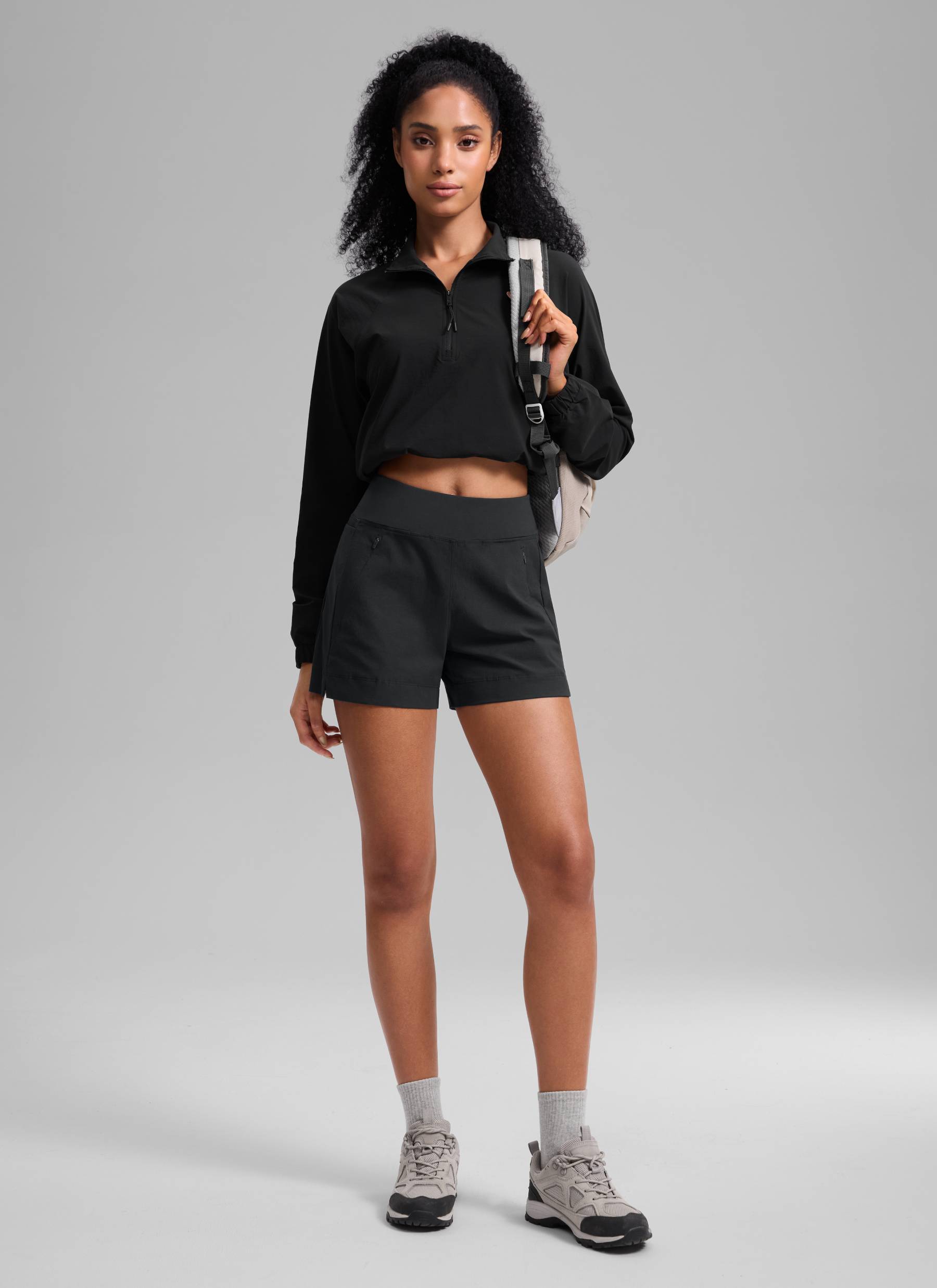 CRZ YOGA Women's Hiking Ripstop Mid-Rise Hiking Shorts Zip Pockets 4'' Ink Gray @model_info:Samira