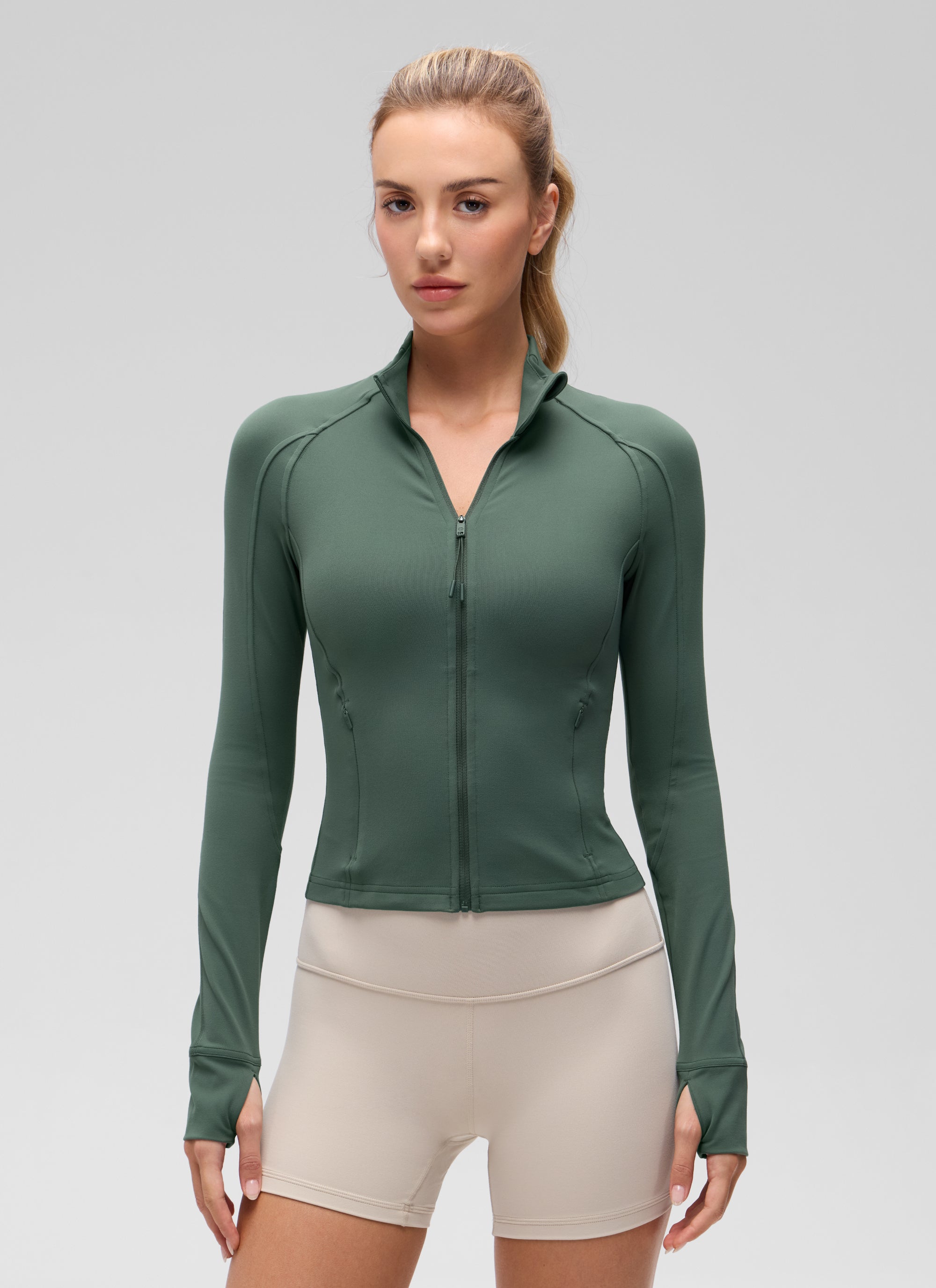 CRZ YOGA Women's Butterluxe Cropped Pocket Outerwear Full Zip Jackets Dark Forest Green @model_info:Anna