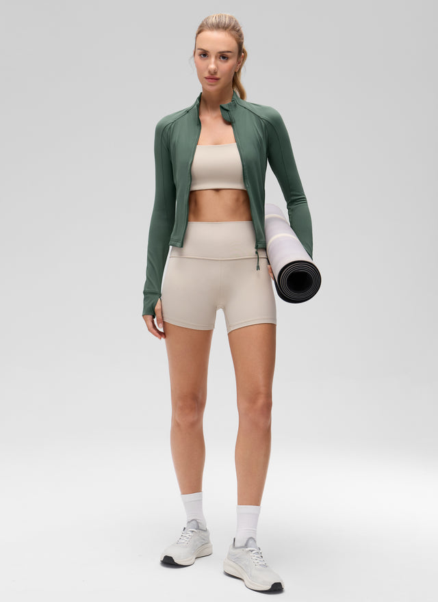 CRZ YOGA Women's Butterluxe Cropped Pocket Outerwear Full Zip Jackets Dark Forest Green @model_info:Anna