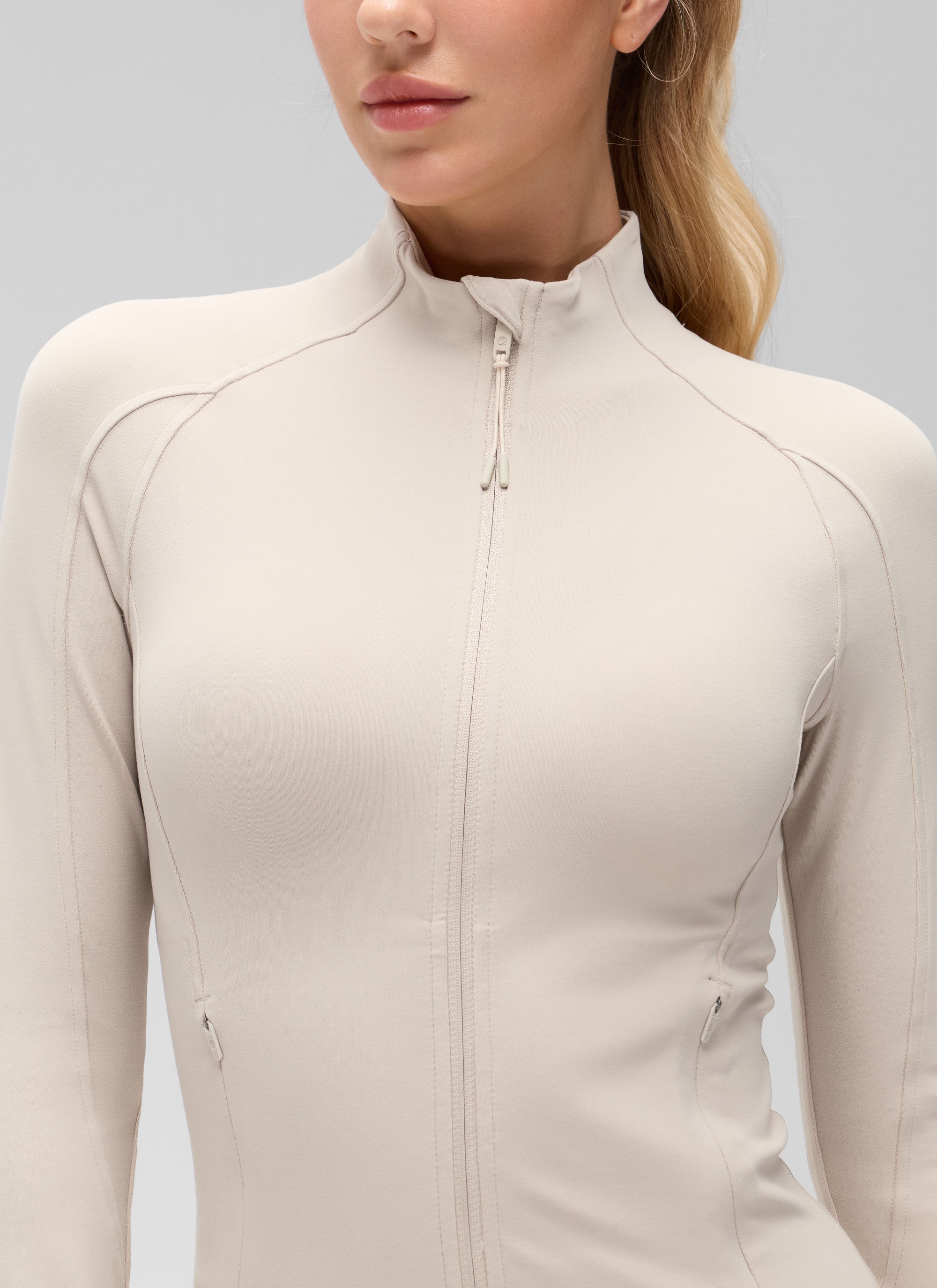 CRZ YOGA Women's Butterluxe Cropped Pocket Outerwear Full Zip Jackets Mojave Tan @model_info:Anna