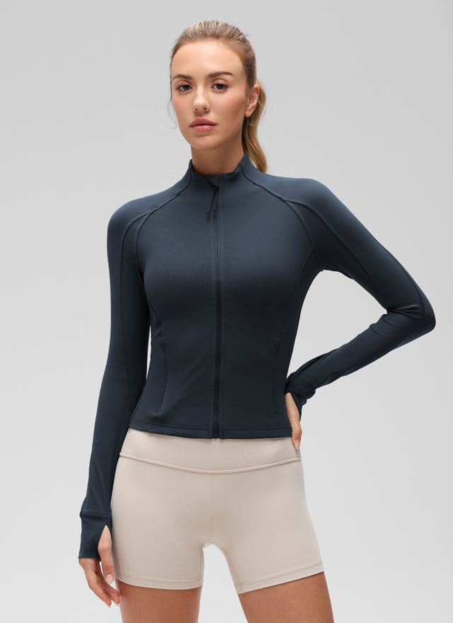 CRZ YOGA Women's Butterluxe Cropped Pocket Outerwear Full Zip Jackets True Navy @model_info:Anna