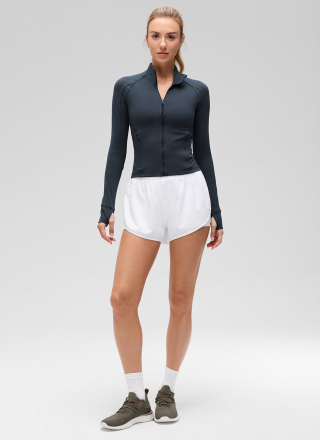 CRZ YOGA Women's Butterluxe Cropped Pocket Outerwear Full Zip Jackets True Navy @model_info:Anna