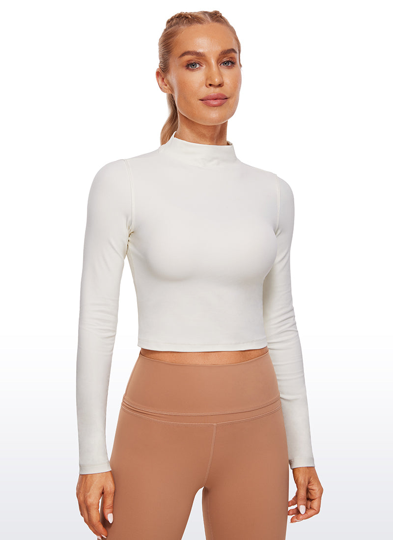 CRZ YOGA Women's Slim Fit Butterluxe Yoga Crop Long Sleeves Mock Turtleneck White Apricot @model_info:NAT