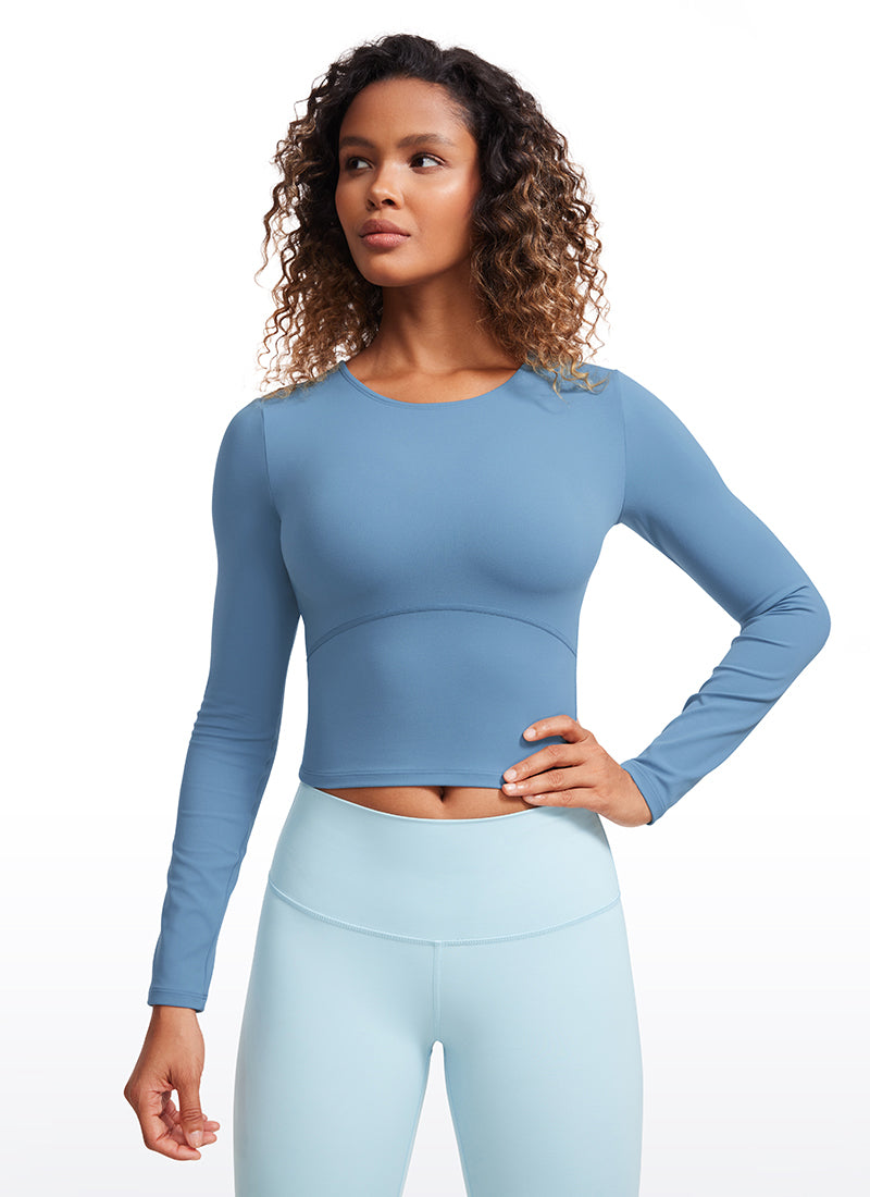 CRZ YOGA Women's Slim Fit Yoga Butterluxe Crop Long Sleeves Front Seam Universe Blue @model_info:Gigi