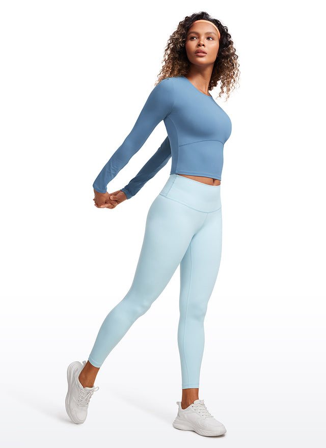 CRZ YOGA Women's Slim Fit Yoga Butterluxe Crop Long Sleeves Front Seam Universe Blue @model_info:Gigi